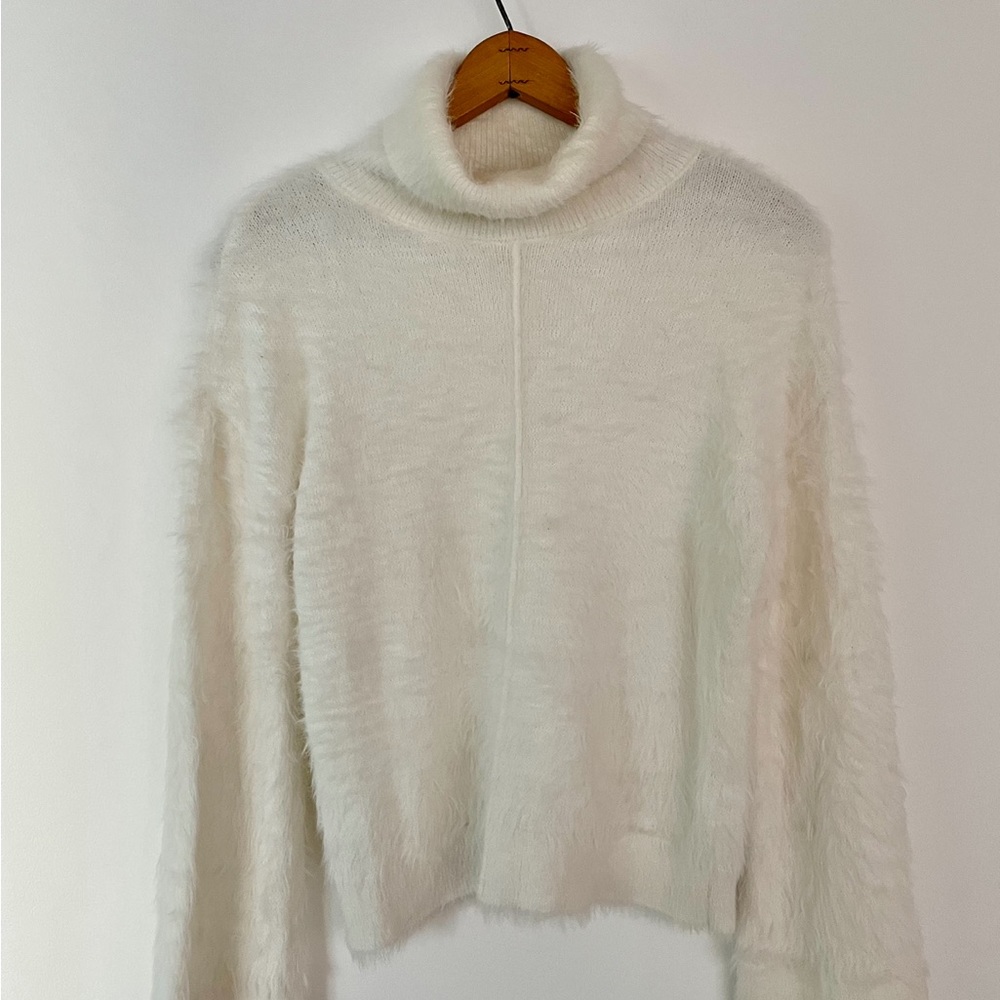 INC International Concepts White eyelash turtleneck sweater.